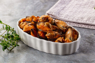 Peeled mussels heap in the bowl