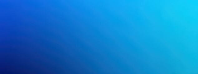 Obraz premium A blue background with a gradient of light blue to dark blue