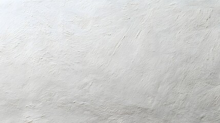 Obraz premium A textured white wall background with subtle variations in tone