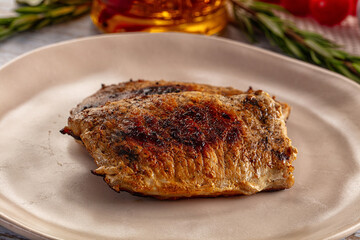 Roasted pork schnitzel steak piece