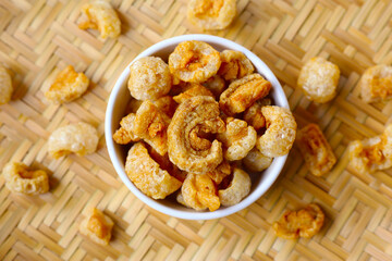Crispy pork cracklings, a crunchy savory snack.