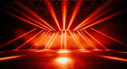Stage with many red spotlights creating a dramatic atmosphere and light beams