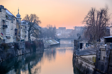 Ljubljanica river across Ljubljana with bridges and historic architecture