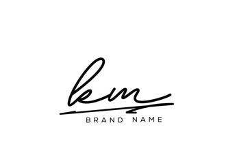 Obraz premium KM letter elegant cursive beauty handwriting logo.