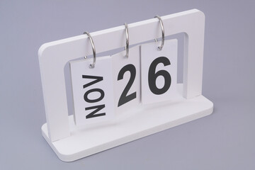 November, 26 on calendar on grey background.	