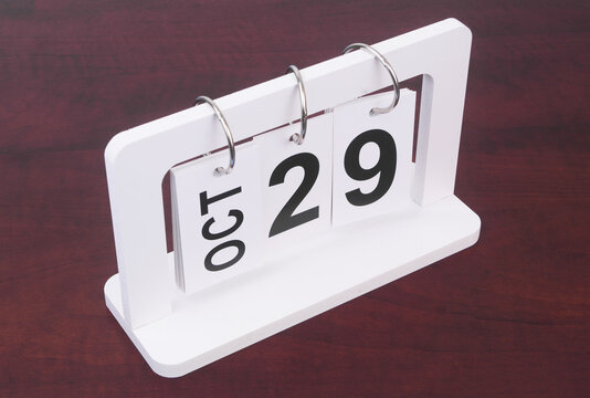 October, 29 on calendar on wooden background.	