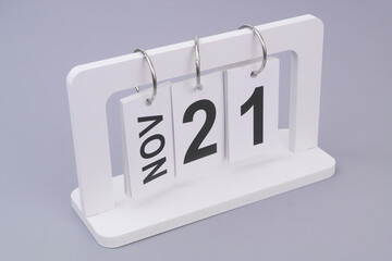 November, 21 on calendar on grey background.	