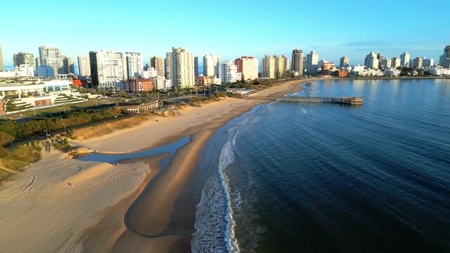 Aerial View of Playa Mansa with Pier and Punta del Este Skyline
