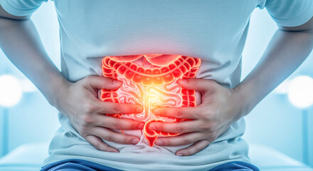 Person with severe stomach pain holding abdomen with glowing intestine hologram, concept of digestive system disease, food poisoning or intestinal inflammation, medical background.
