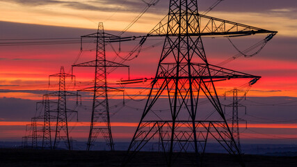 Sunrise over Electricity Pylons Across Rishworth Moor  Yorkshire
