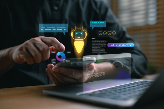 Man using smartphone and laptop to interact with AI assistant chatbot for data analysis. Concept of artificial intelligence, big data, analytics, business insight, and smart technology integration.