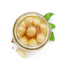 Pickled asparagus in jar and spices isolated on white, top view