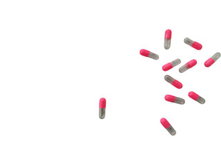 Isolated Pink and Transparent Capsule Shell on White Background, Pharmaceutical Medicine