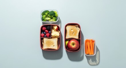 Healthy Lunchbox with Fruits, Vegetables, and Bread.