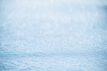 Obraz premium natural winter background, fresh fluffy snow, sun glare