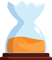 Hourglass with orange sand inside, placed on wooden stand, measuring passing time