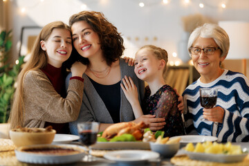 Family celebrating Thanksgiving Day