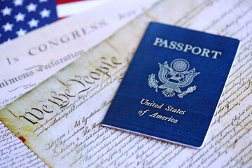 US passport on replica pages of the United States Constitution close up