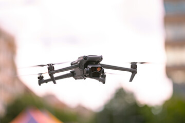 Professional drone with camera is hovering