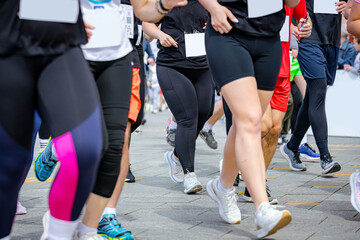 Large group of athletes running marathon