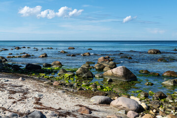 Rocky shoreline with boulders at Cape Arkona on the island of Rügen Germany