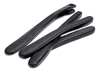 Obraz premium Four black plastic handles, textured, close-up