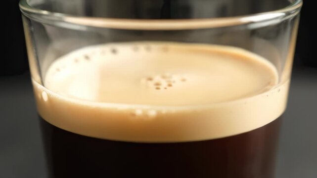 Soy Milk Foam Rising Over Espresso Harmony