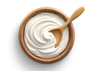 Creamy sauce in wooden bowl with spoon