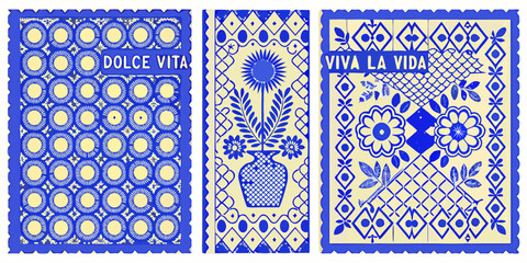 Traditional mexican papel picado banners with floral motifs and text phrases dolce vita and viva la vida