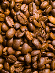 Close up of roasted coffee beans with rich brown texture