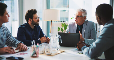 Boardroom, laptop and management with business people at table together for coaching or training. Computer, conversation and meeting with mentor teaching employee team in workplace for development