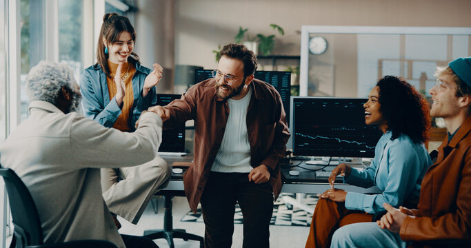 Man, meeting and finance group with applause for investment success, trading dashboard or fist bump. Business men, stock market and achievement with support gesture for financial profit or growth - Powered by Adobe