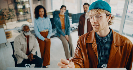 Man, startup and writing on whiteboard for presentation at office meeting, team and notes at media company. Person, above and planning with collaboration, solution or brainstorming at creative agency