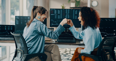 Business, women and finance team with fist bump for investment success, trading dashboard and financial growth. People, stock market and achievement with partner, support gesture and trader profit