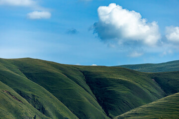 green mountains and blue sky