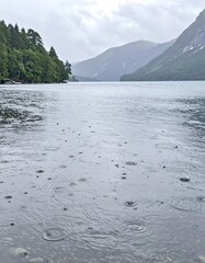 Calm lake with rain drops