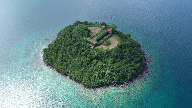 Aerial drone view of islet Ramiers in Martinique with historic fort and turquoise Caribbean waters