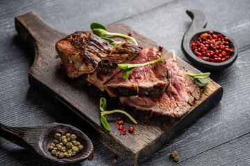 Grilled beef steak slices with spices