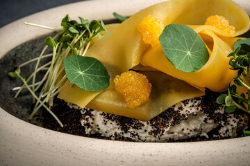 Molecular pasta with salmon cream and caviar