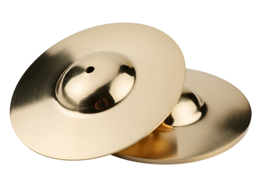 Two gold-toned cymbal-like percussion instruments stand out against a black background, showcasing their smooth surfaces and a central hole.