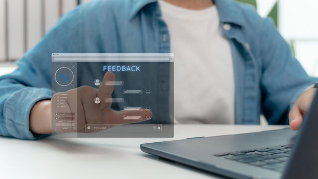 AI chatbot customer feedback and support concept. Person using futuristic virtual screen with digital comments and responses. Artificial intelligence in business communication and online service.