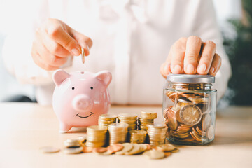 Businesswoman focused on saving money, smart financial planning, using banking, investment...