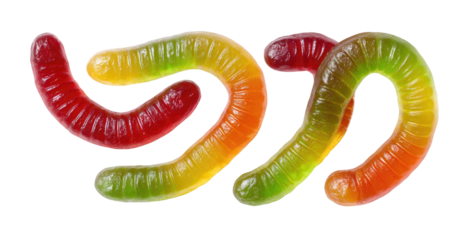 Colorful gummy worms on black background
