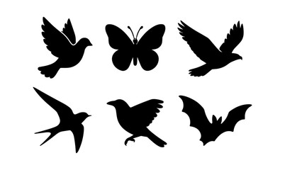 Fototapeta premium Silhouette of various flying creatures: birds, butterfly, and bat in flight