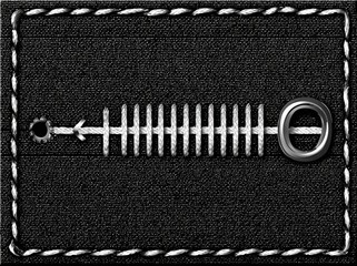 Close-up of a black denim patch with a white zipper