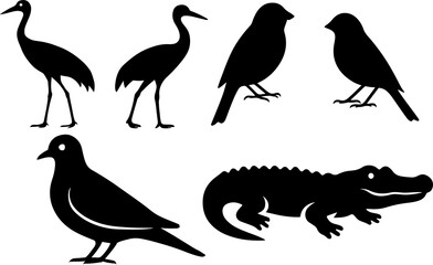 Obraz premium A collection of black silhouette images featuring birds and an alligator on a white background
