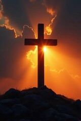 Dark silhouetted cross against radiant golden glowing backdrop, illumination, spirituality