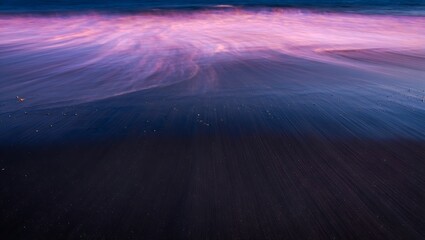 Abstract swirling purple and pink smoke against a dark background