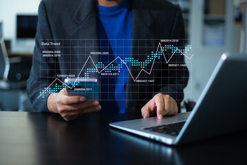 A professional uses technology for business, from data analysis to AI and network security. Perfect for themes of innovation, modern work, and success.