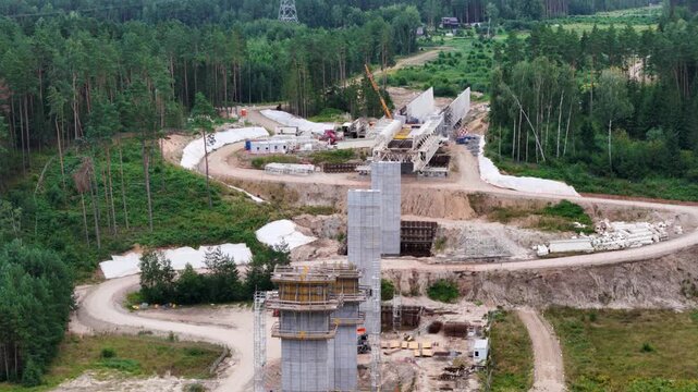 Building columns for railway bridge, aerial orbit view